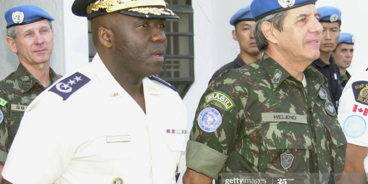 Rameau NORMIL perd les pédales et est remplacé par Léon CHARLES à la Direction Générale de la PNH